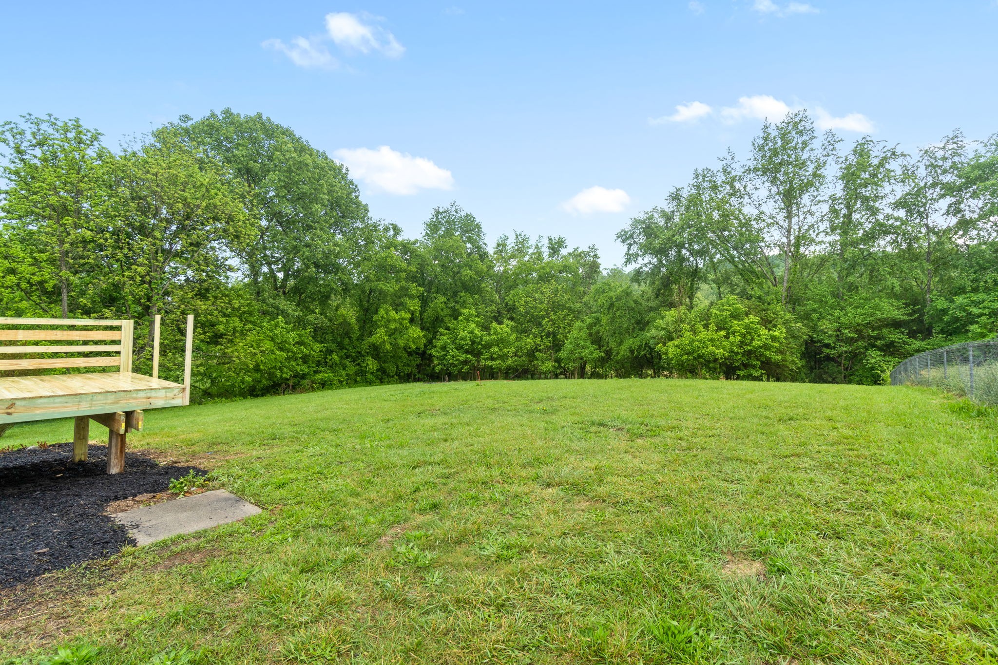 198 Cummings Creek Road Clarksville, TN 37042 - Photo 35 of 43 a view of a park with a bench and trees