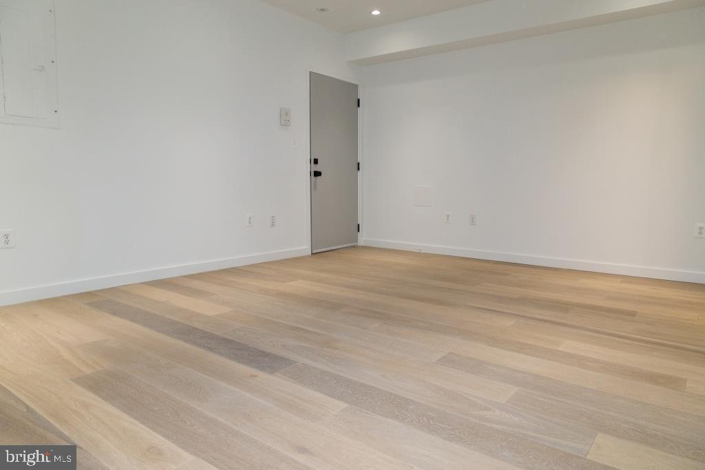 1443 Euclid Street Northwest, Unit 1 Washington, DC 20009 - Photo 5 of 14 a view of an empty room