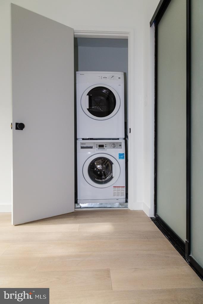1443 Euclid Street Northwest, Unit 1 Washington, DC 20009 - Photo 8 of 14 a close up view of a washer and dryer