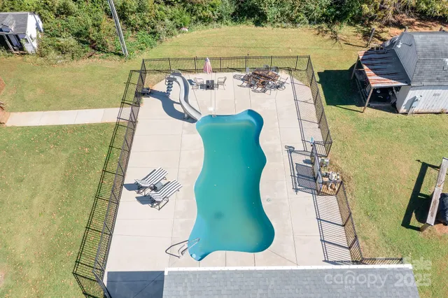 an aerial view of a swimming pool