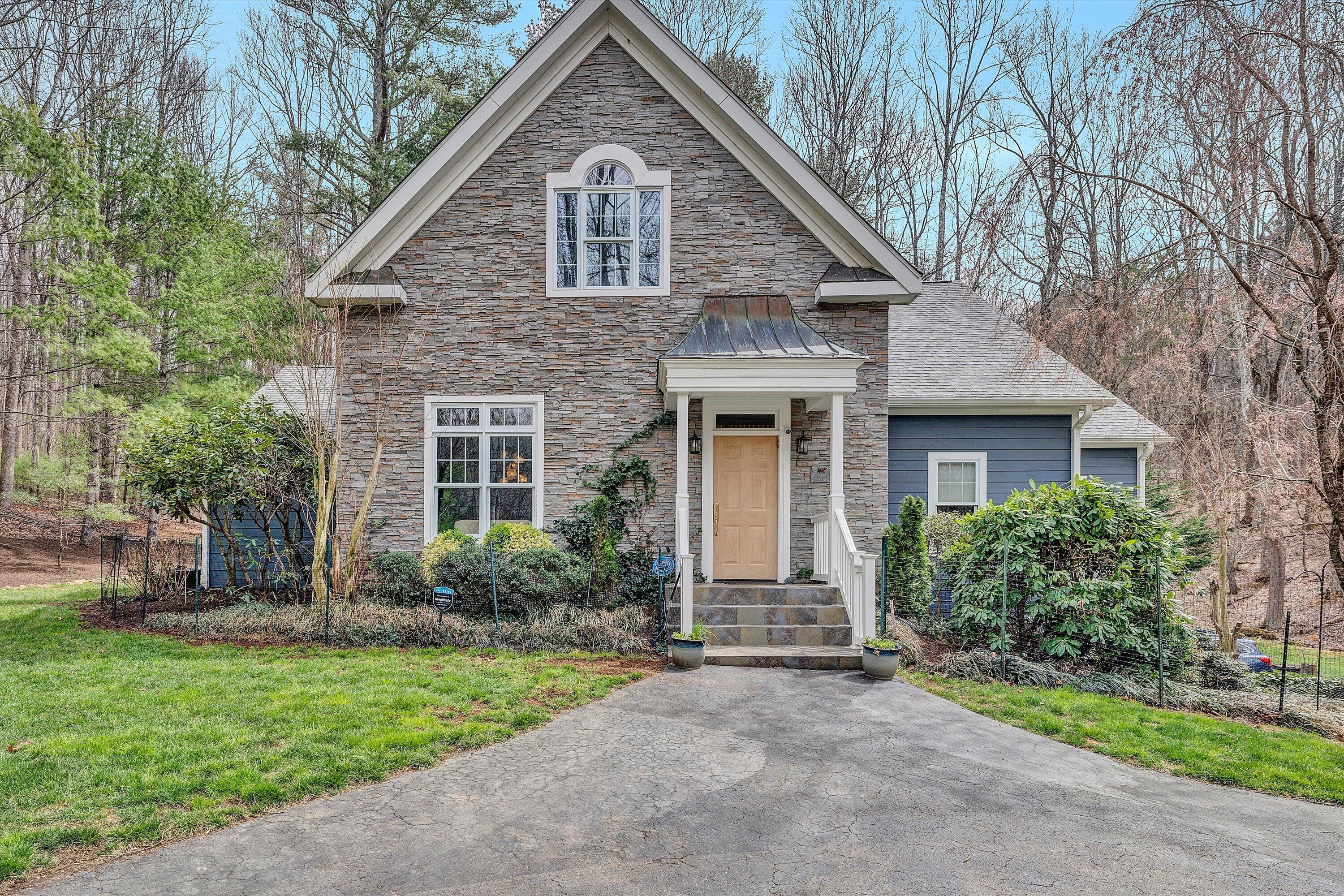 5671 Split Rail Lane Roanoke, VA 24018 - Photo 1 of 71 a front view of a house with garden
