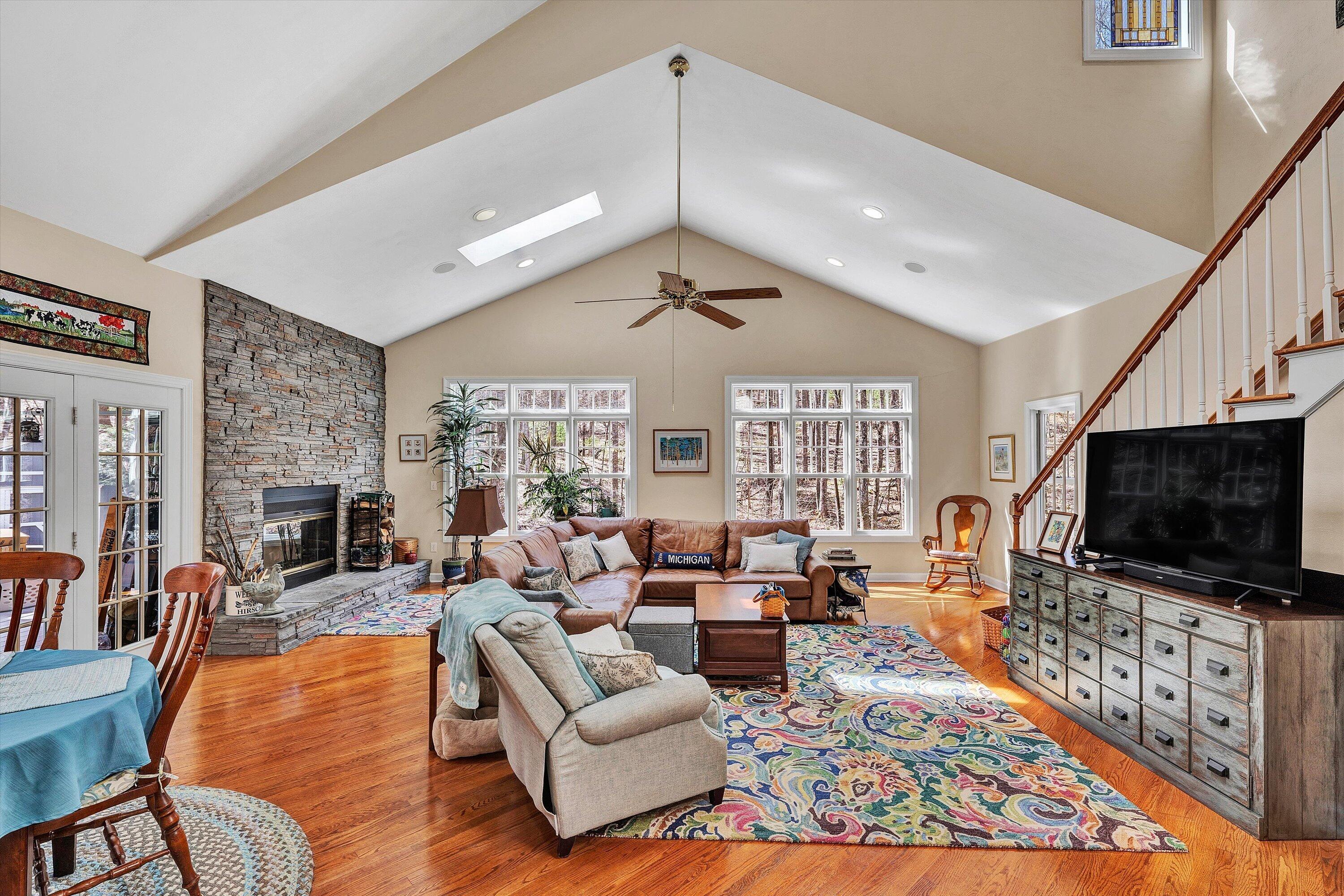 5671 Split Rail Lane Roanoke, VA 24018 - Photo 11 of 71 a living room with fireplace furniture and a flat screen tv