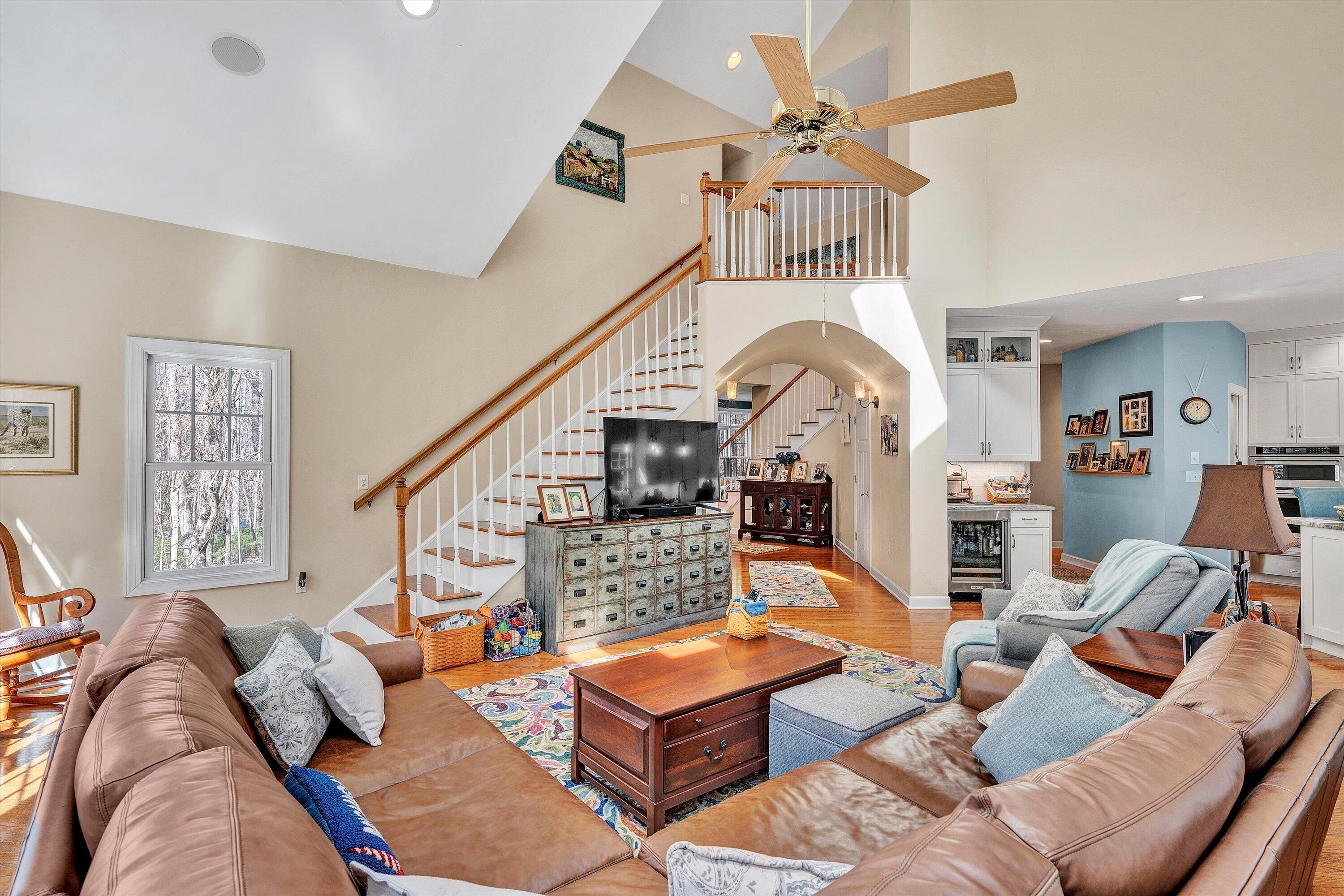 5671 Split Rail Lane Roanoke, VA 24018 - Photo 12 of 71 a living room with furniture a rug and a chandelier