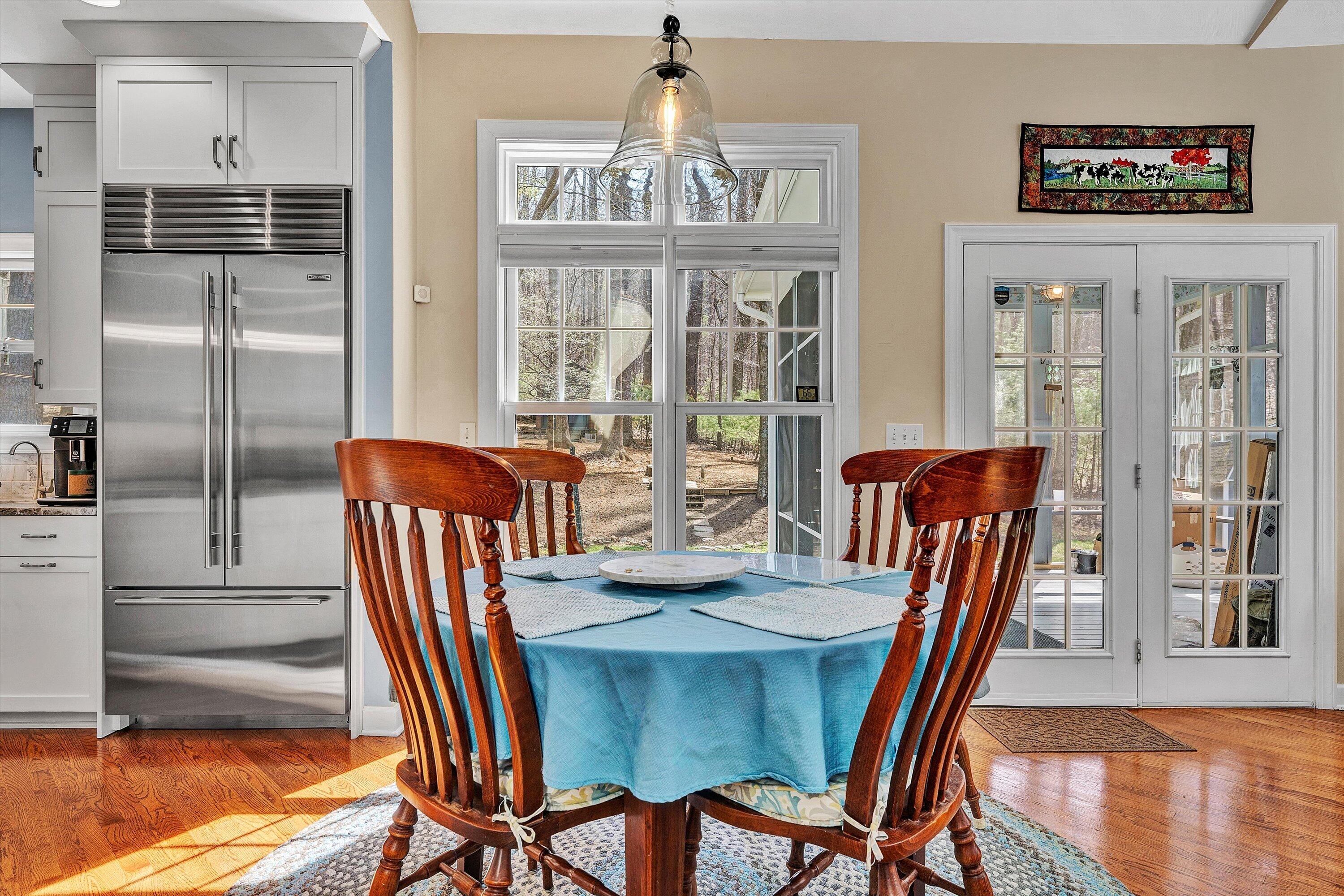 5671 Split Rail Lane Roanoke, VA 24018 - Photo 15 of 71 a view of a dining room with furniture window and wooden floor