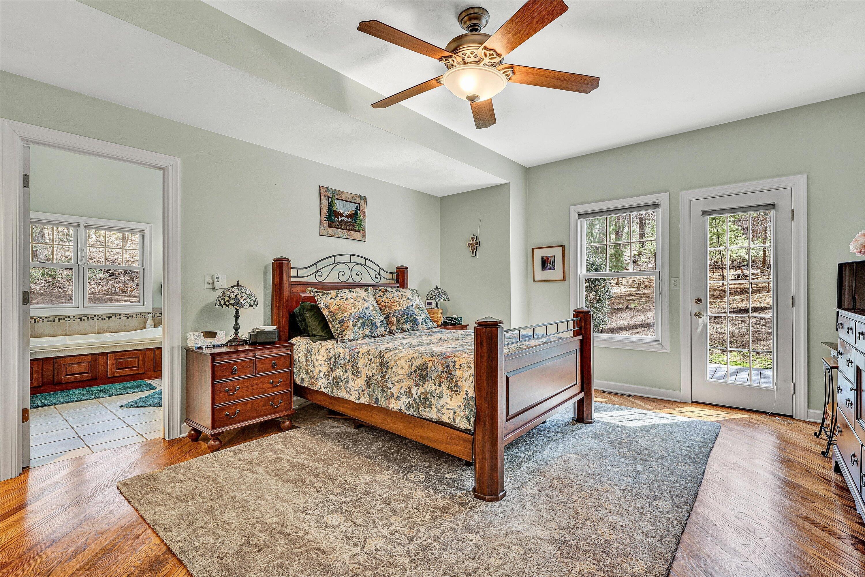 5671 Split Rail Lane Roanoke, VA 24018 - Photo 23 of 71 a bedroom with a bed and a chandelier