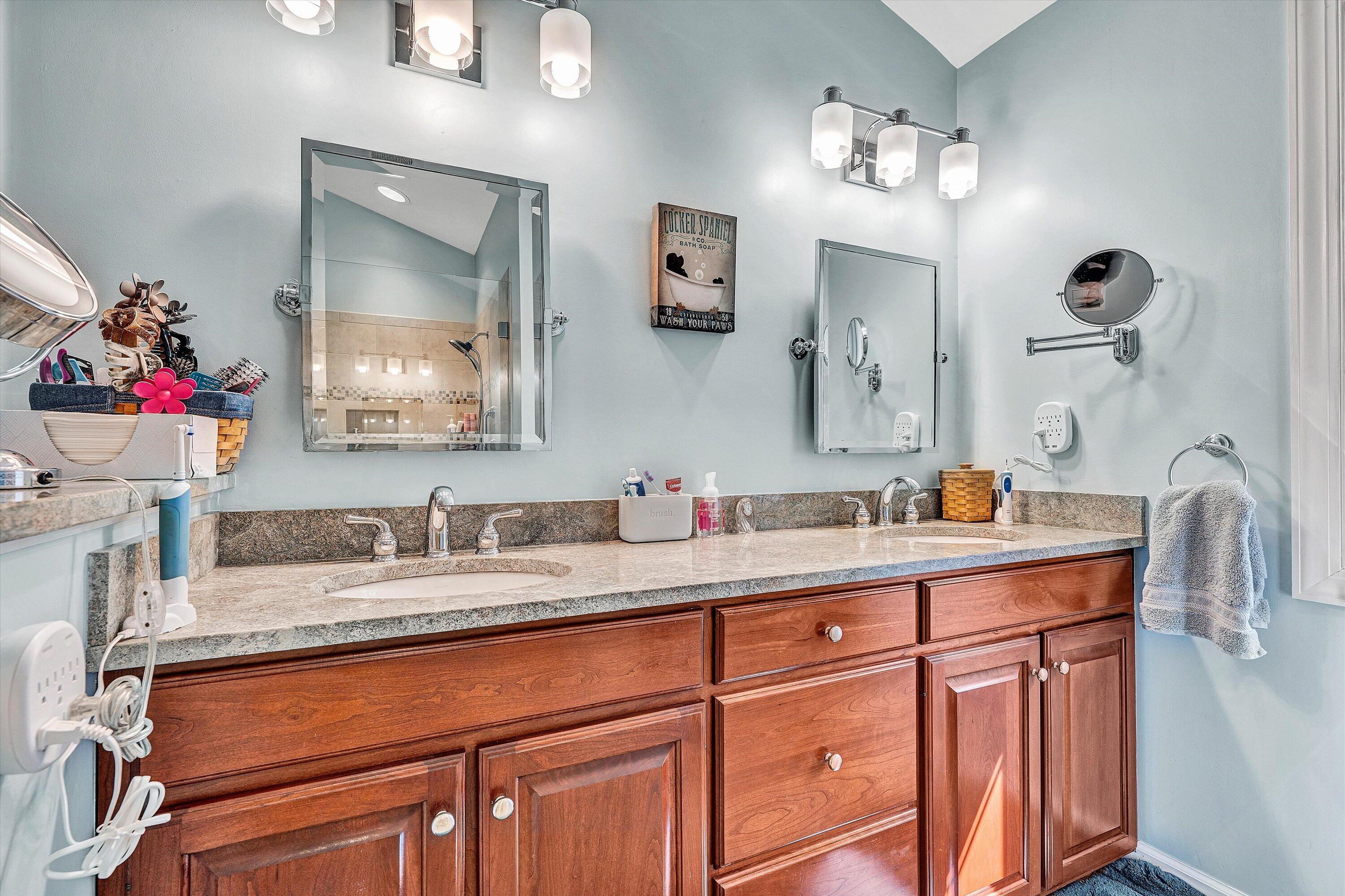 5671 Split Rail Lane Roanoke, VA 24018 - Photo 25 of 71 a bathroom with a sink double vanity and a mirror