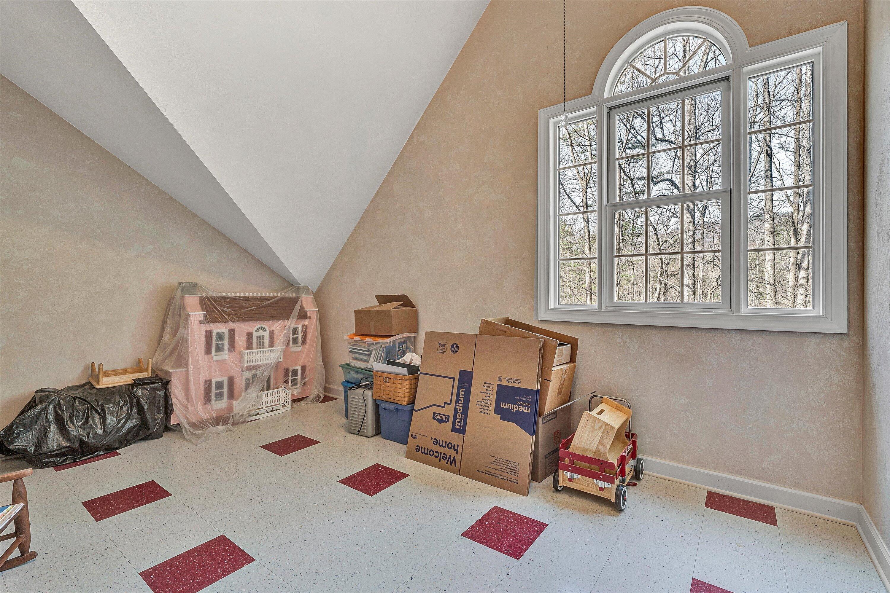 5671 Split Rail Lane Roanoke, VA 24018 - Photo 39 of 71 a living room with furniture a rug and a table