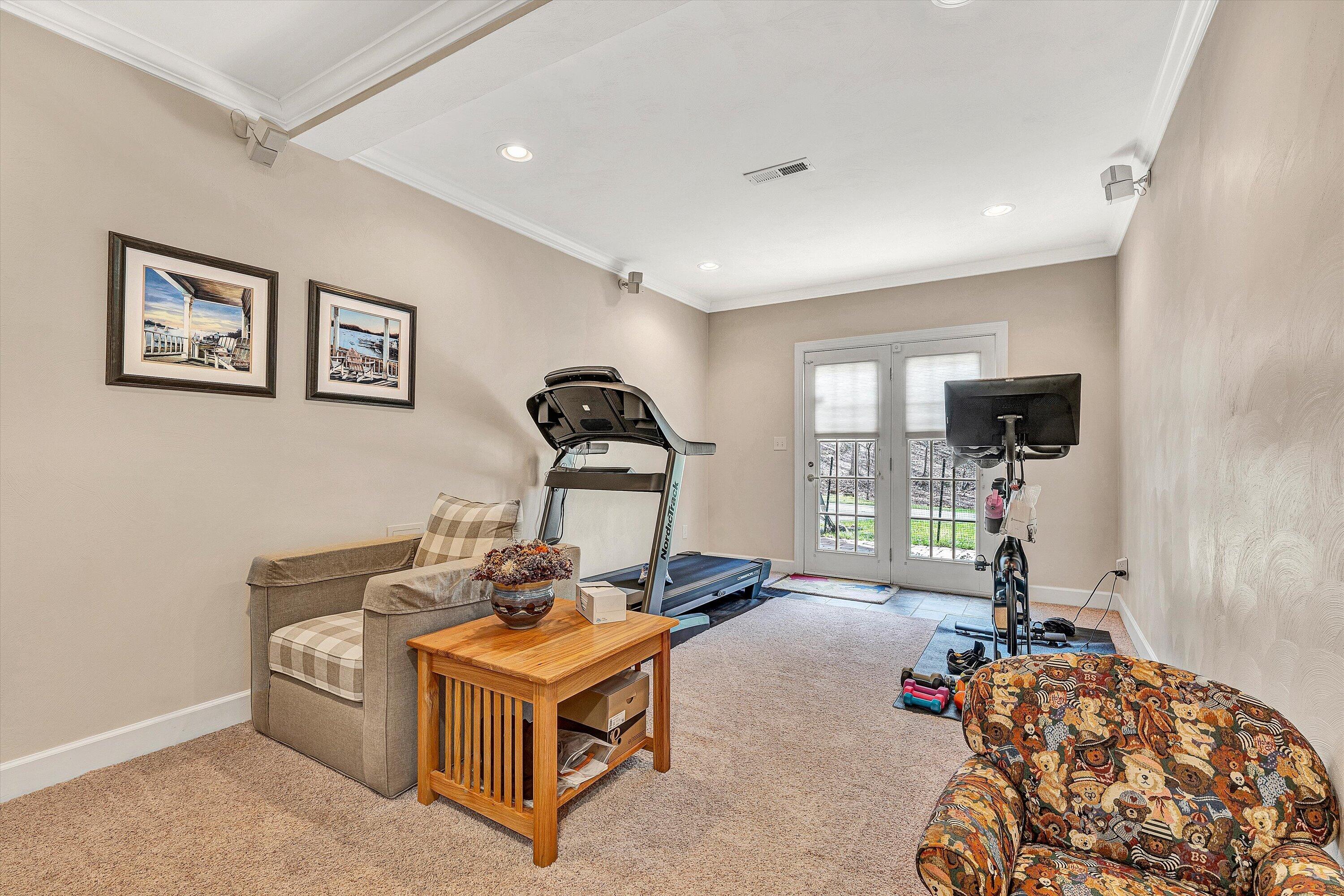 5671 Split Rail Lane Roanoke, VA 24018 - Photo 41 of 71 a living room with furniture a flat screen tv and a window