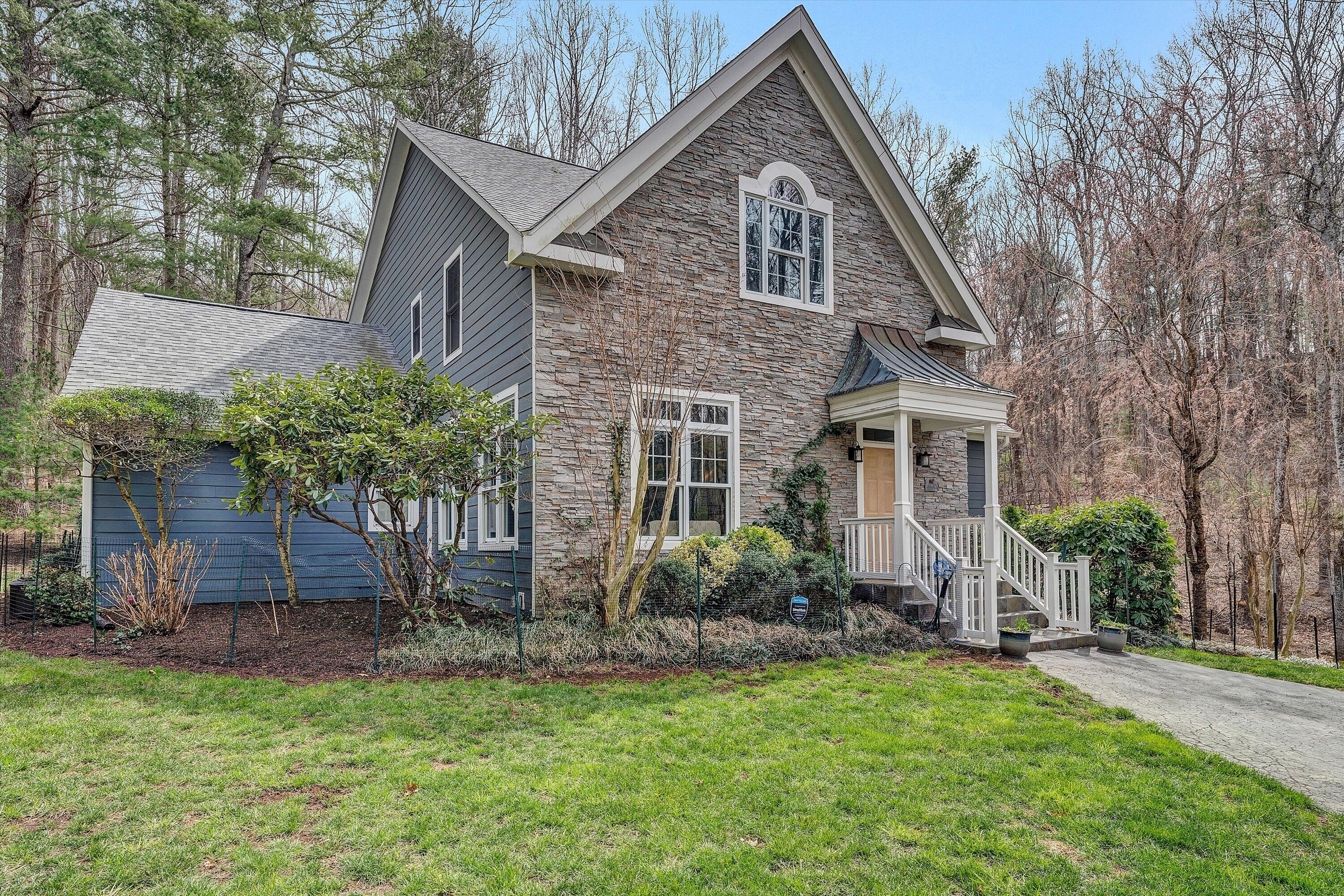 5671 Split Rail Lane Roanoke, VA 24018 - Photo 53 of 71 front view of a house with a yard