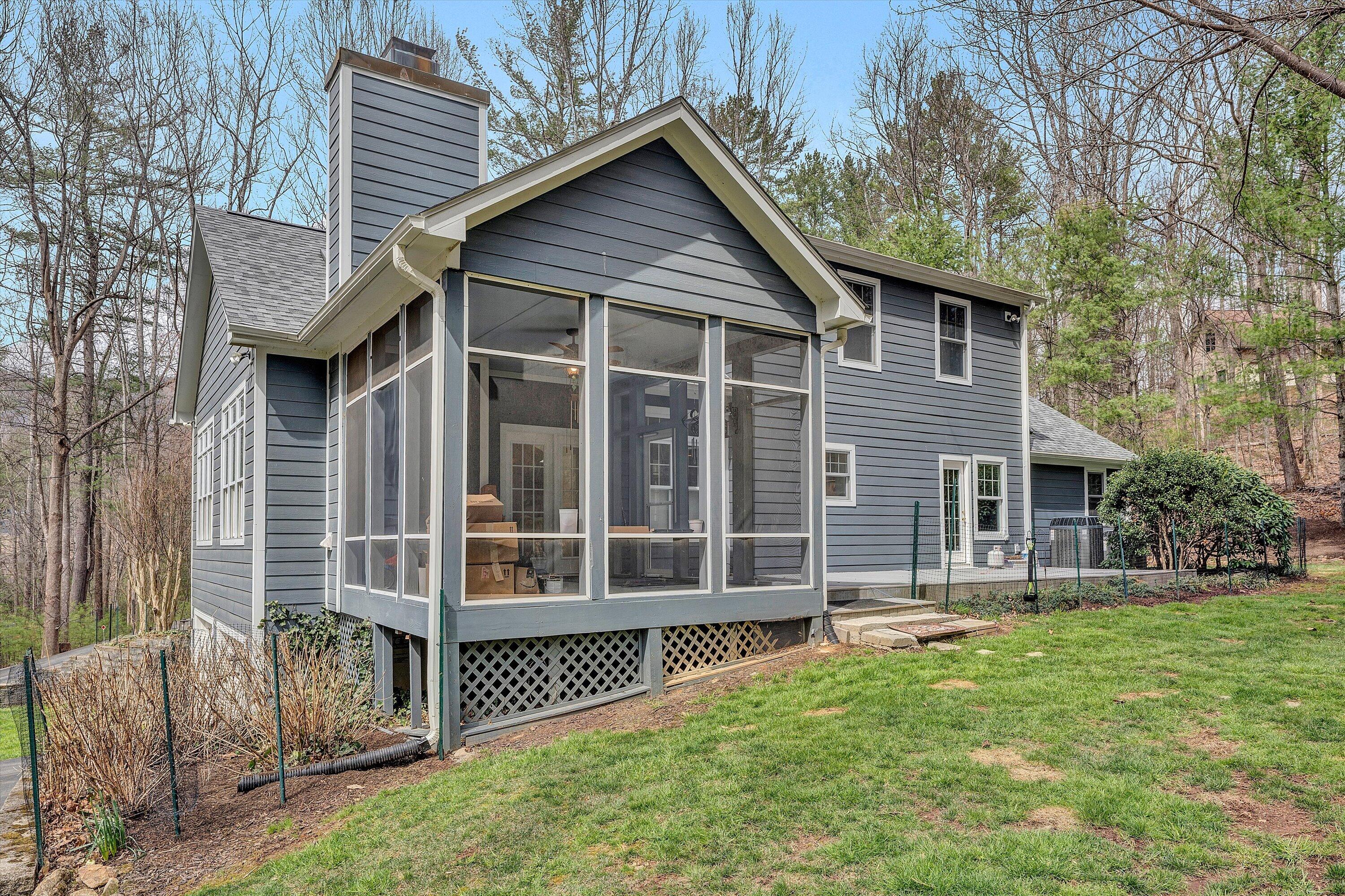 5671 Split Rail Lane Roanoke, VA 24018 - Photo 61 of 71 a view of a house with a yard and wooden fence