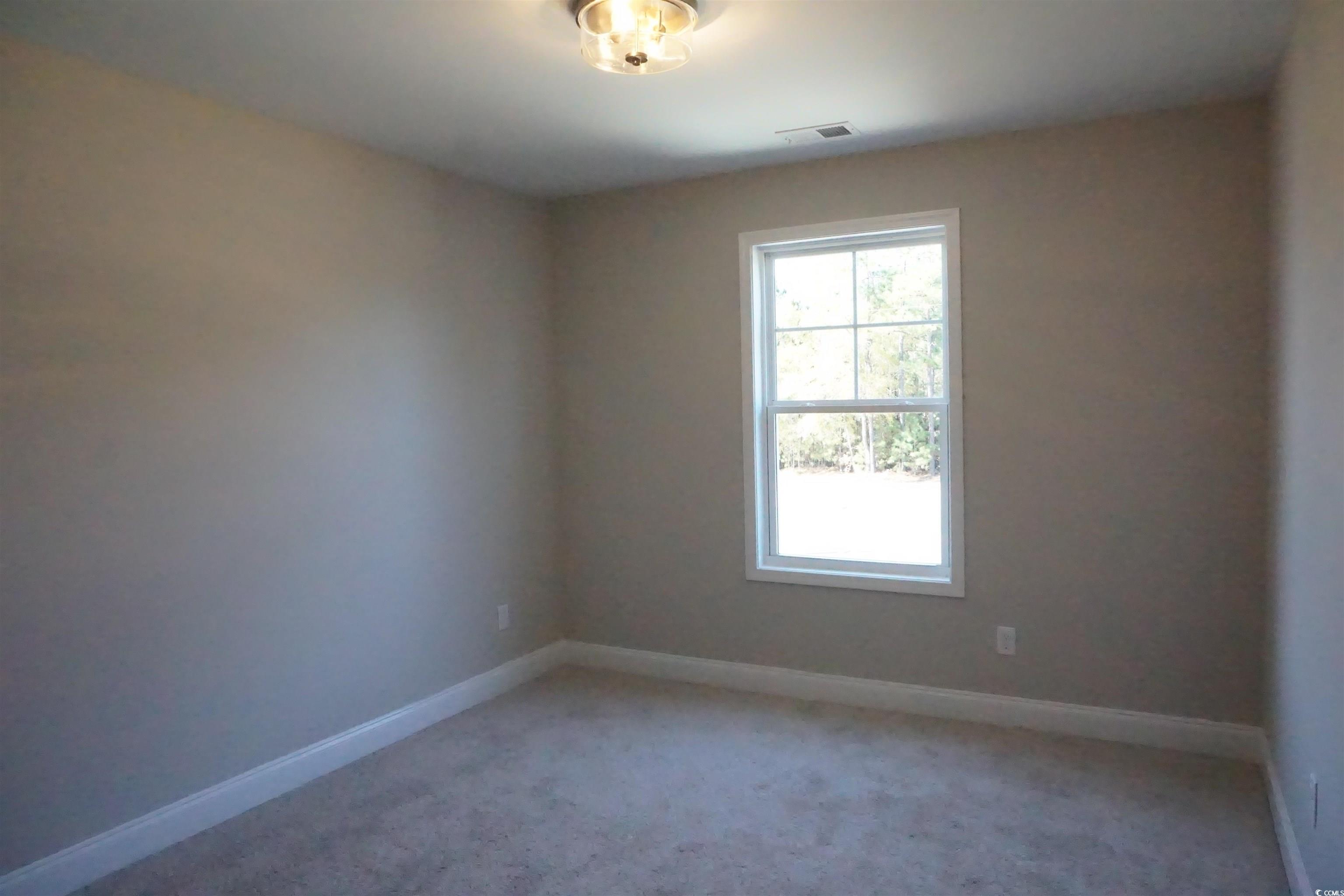 3125 Tiger Tail Road Conway, SC 29526 - Photo 14 of 37 Spare room featuring carpet
