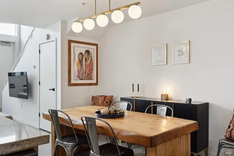 a view of a dining room with furniture