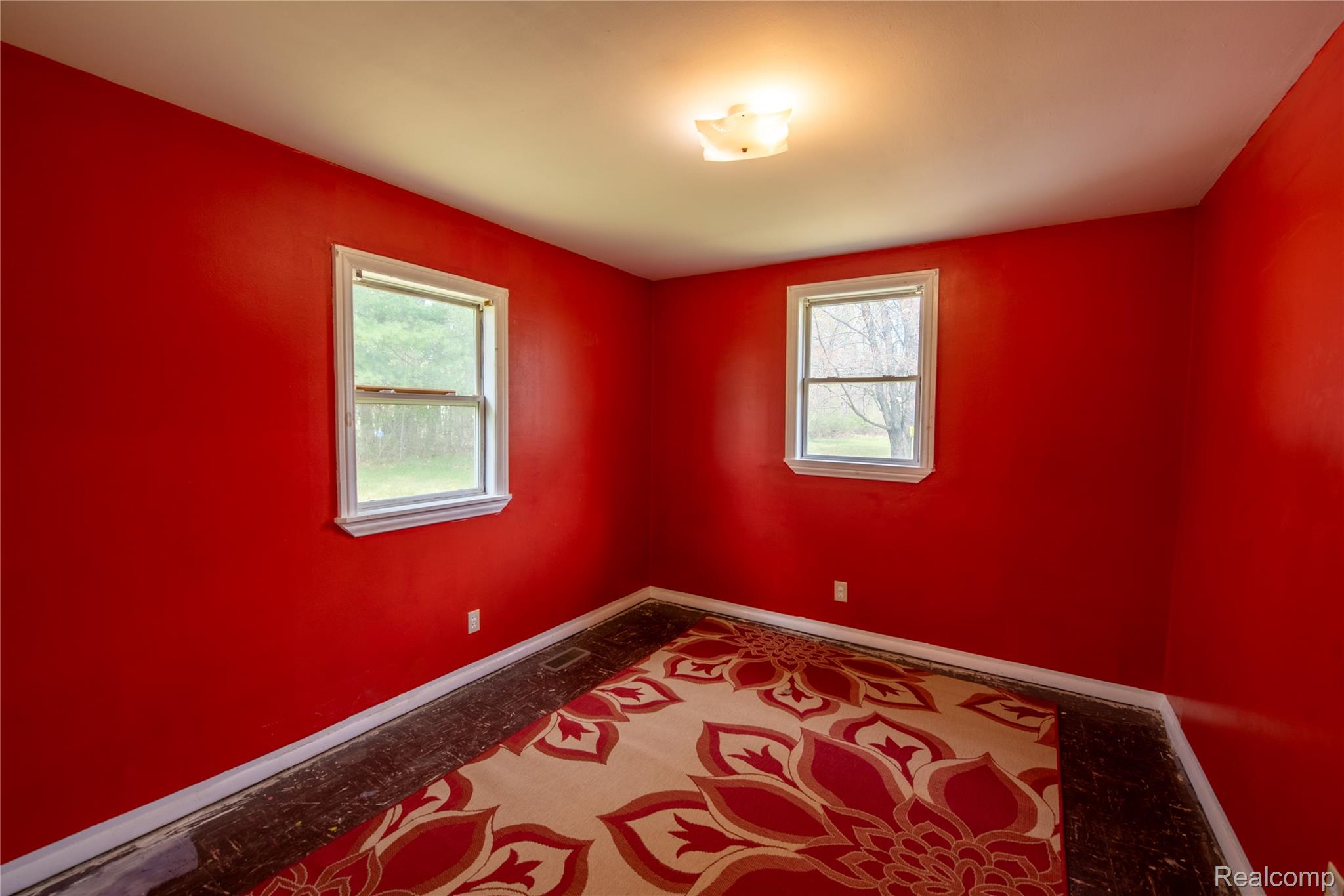 1190 Meadow Road Tawas City, MI 48763 - Photo 19 of 26 Unfurnished room with baseboards