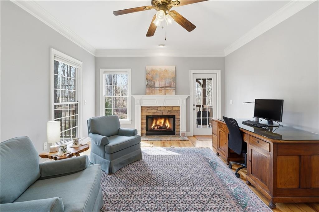 217 Wild Turkey Ridge Ball Ground, GA 30107 - Photo 28 of 55 a living room with furniture and a fireplace