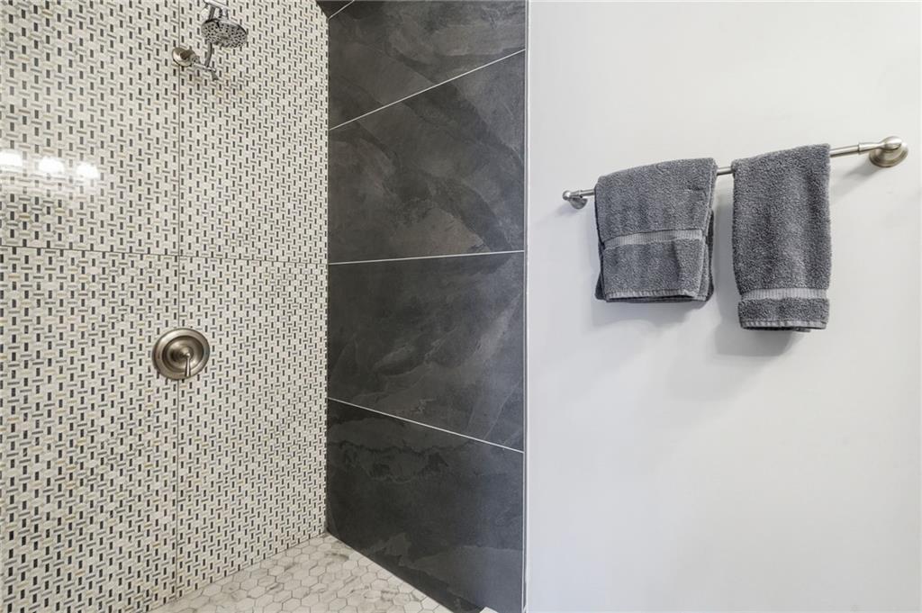 217 Wild Turkey Ridge Ball Ground, GA 30107 - Photo 36 of 55 a bathroom with a shower