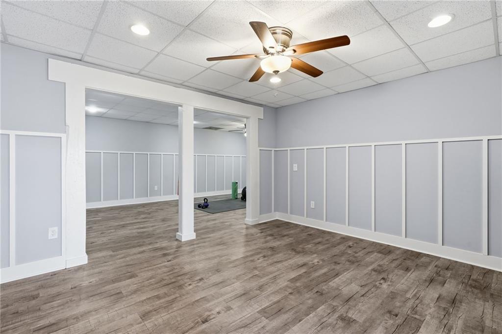 217 Wild Turkey Ridge Ball Ground, GA 30107 - Photo 43 of 55 an empty room with wooden floor and windows