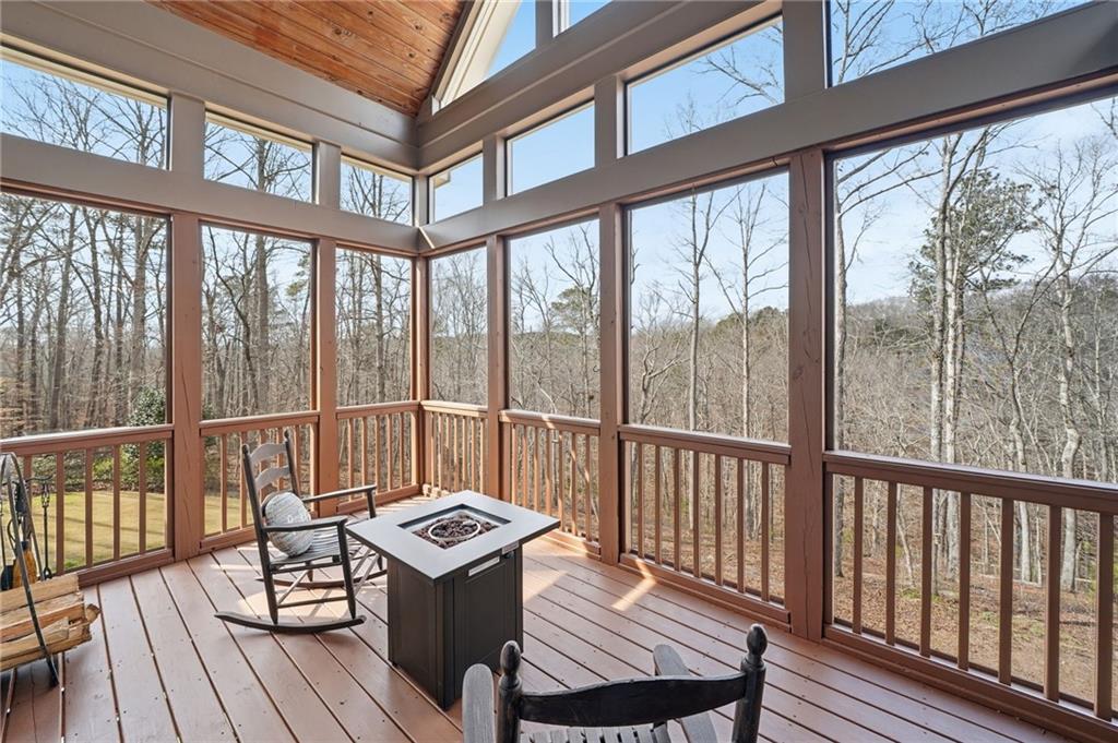 217 Wild Turkey Ridge Ball Ground, GA 30107 - Photo 6 of 55 a view of a balcony with wooden floor