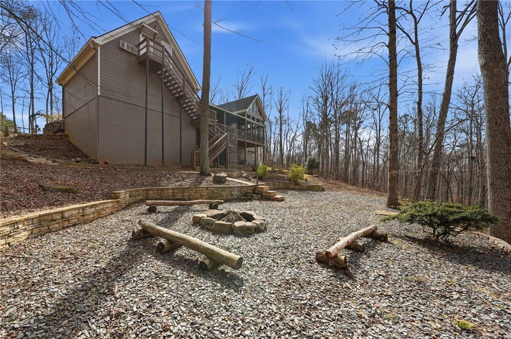 217 Wild Turkey Ridge Ball Ground, GA 30107 - Photo 10 of 55 a view of a backyard with plants