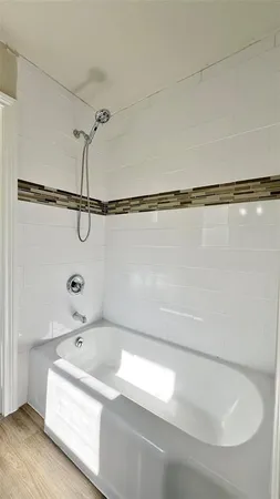 a bathroom with a sink and a bathtub