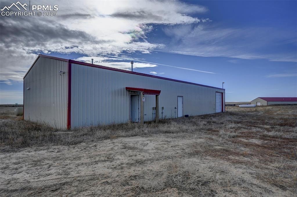 2880 North Ramah Highway Yoder, CO 80864 - Photo 16 of 50 a backyard of a house