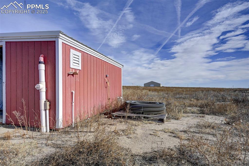 2880 North Ramah Highway Yoder, CO 80864 - Photo 39 of 50 a view of a backyard with hardwood