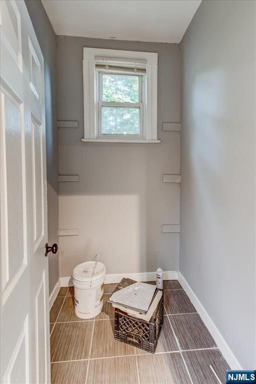 70 South 9th Street Newark, NJ 07107 - Photo 15 of 29 a bathroom with a sink and a mirror