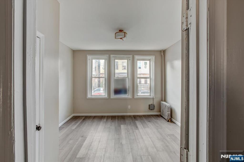 70 South 9th Street Newark, NJ 07107 - Photo 9 of 29 a view of livingroom with window
