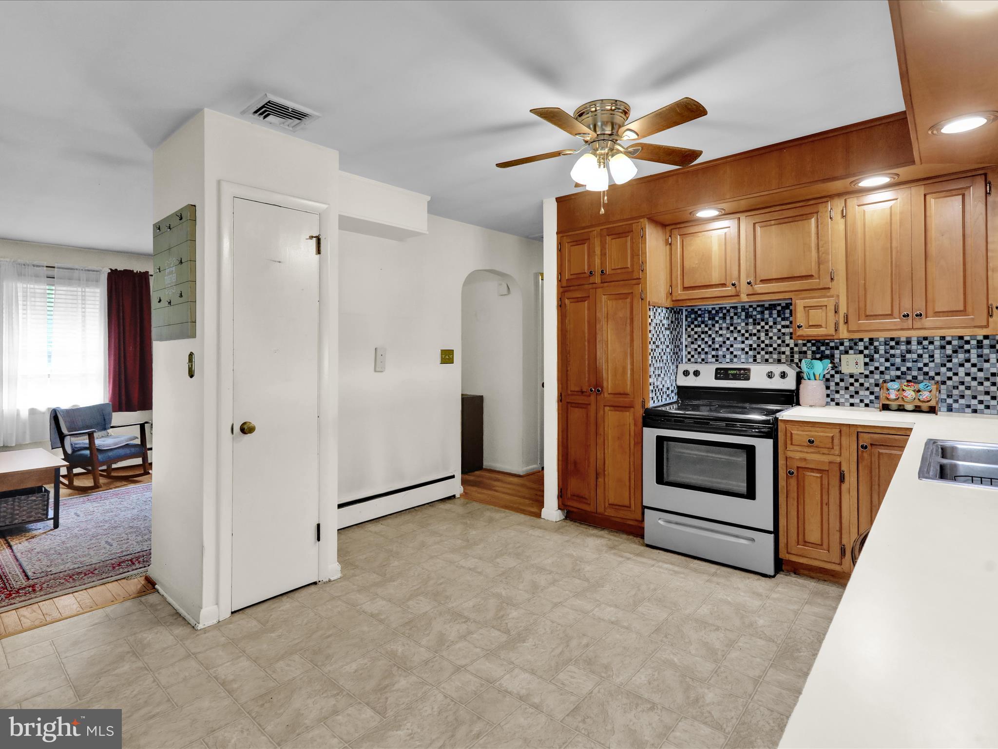 1100 Old Fritztown Road Reading, PA 19608 - Photo 11 of 34 a kitchen with stainless steel appliances kitchen island granite countertop a refrigerator and a sink