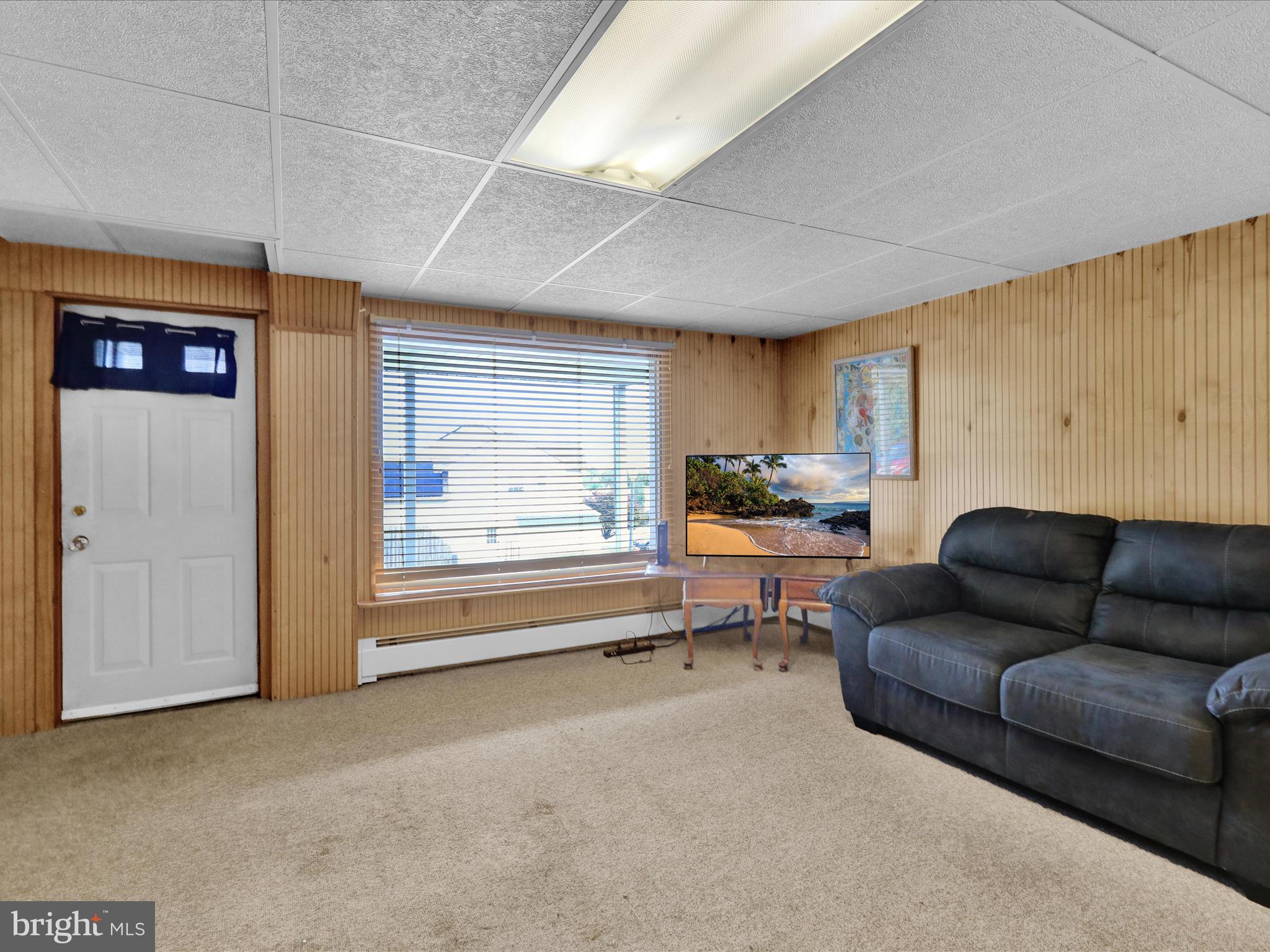 1100 Old Fritztown Road Reading, PA 19608 - Photo 24 of 34 a living room with furniture and a large window