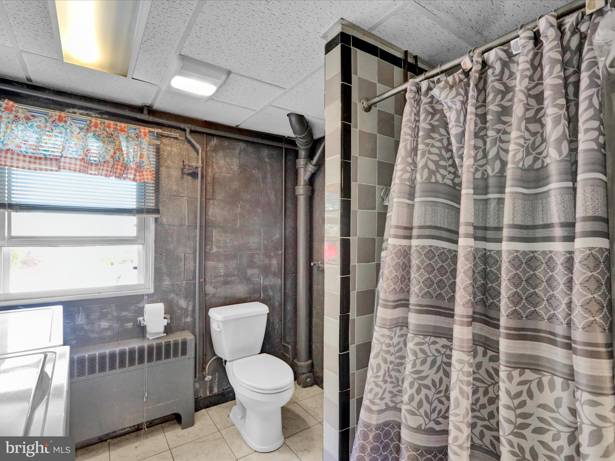 1100 Old Fritztown Road Reading, PA 19608 - Photo 26 of 34 a bathroom with a shower toilet and sink