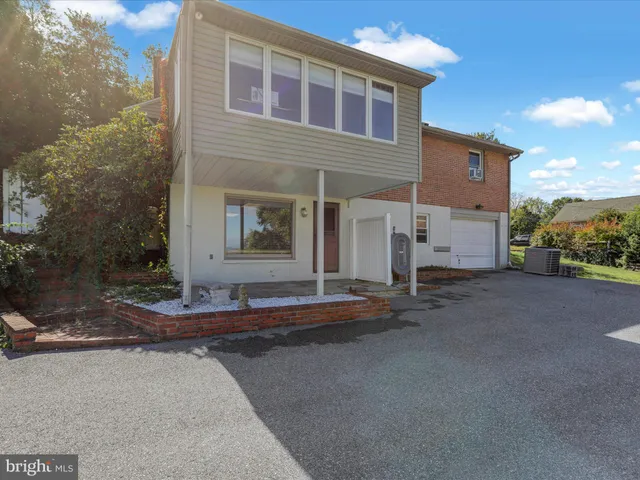 a view of a house with a big yard