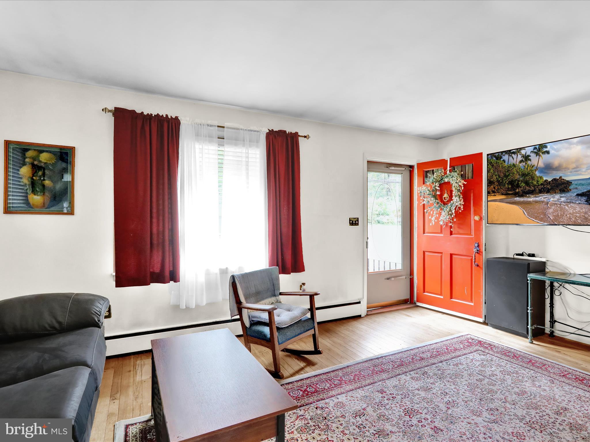 1100 Old Fritztown Road Reading, PA 19608 - Photo 6 of 34 a living room with furniture a rug and a window