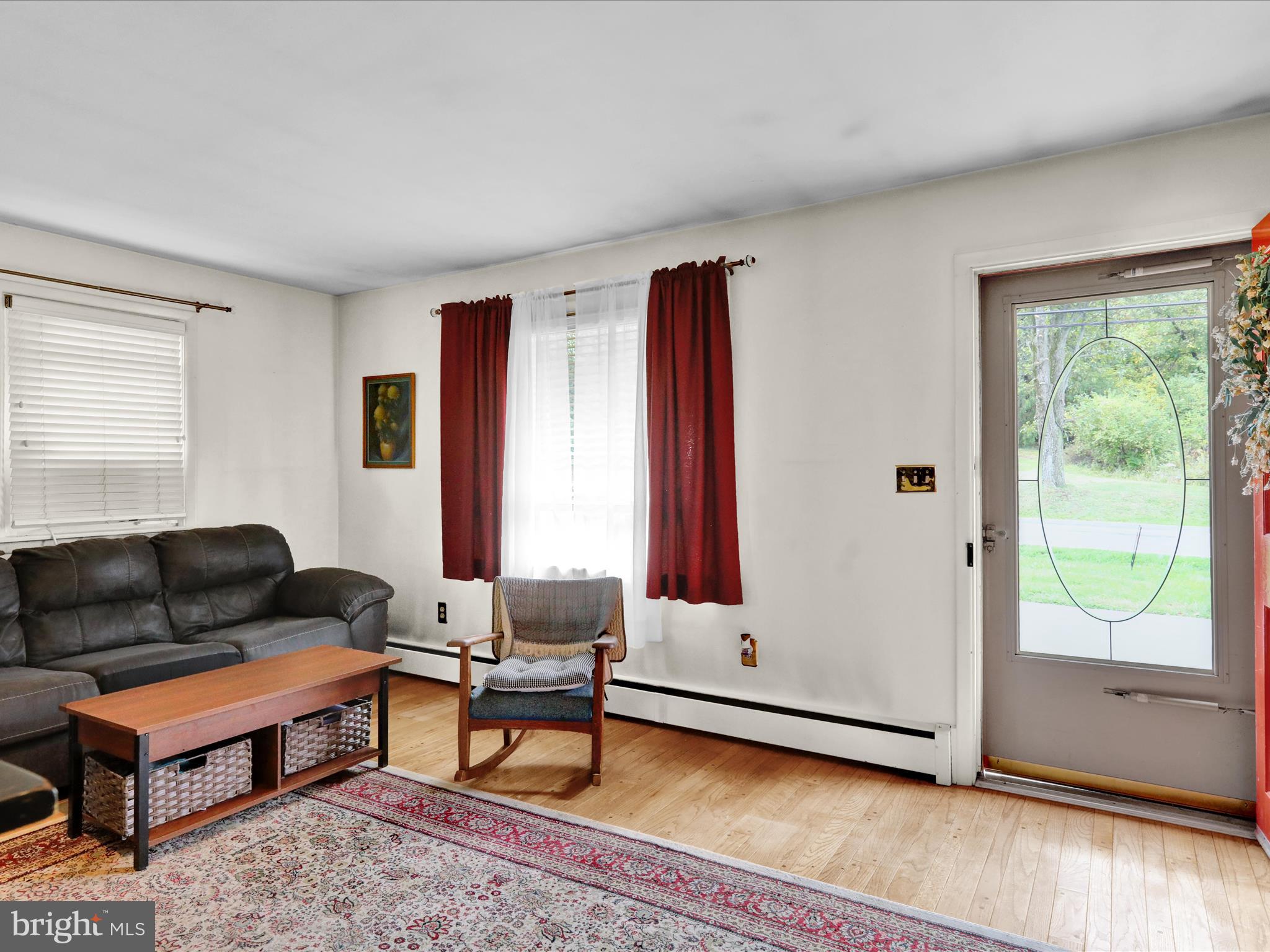 1100 Old Fritztown Road Reading, PA 19608 - Photo 7 of 34 a living room with furniture and a window