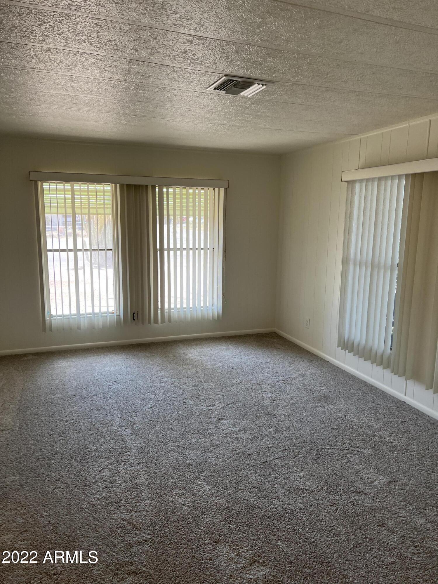 2191 South Tomahawk Road Apache Junction, AZ 85119 - Photo 5 of 15 Living room 2