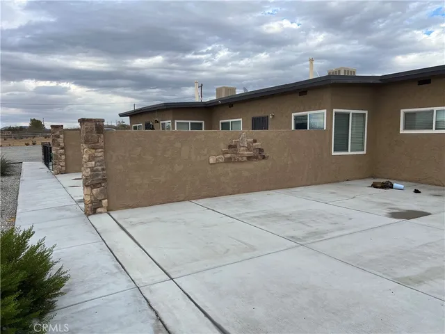 a front view of a house with yard