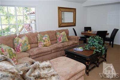 Undisclosed Address Calabasas, CA 91302 - Photo 7 of 10 a living room with furniture and a large window