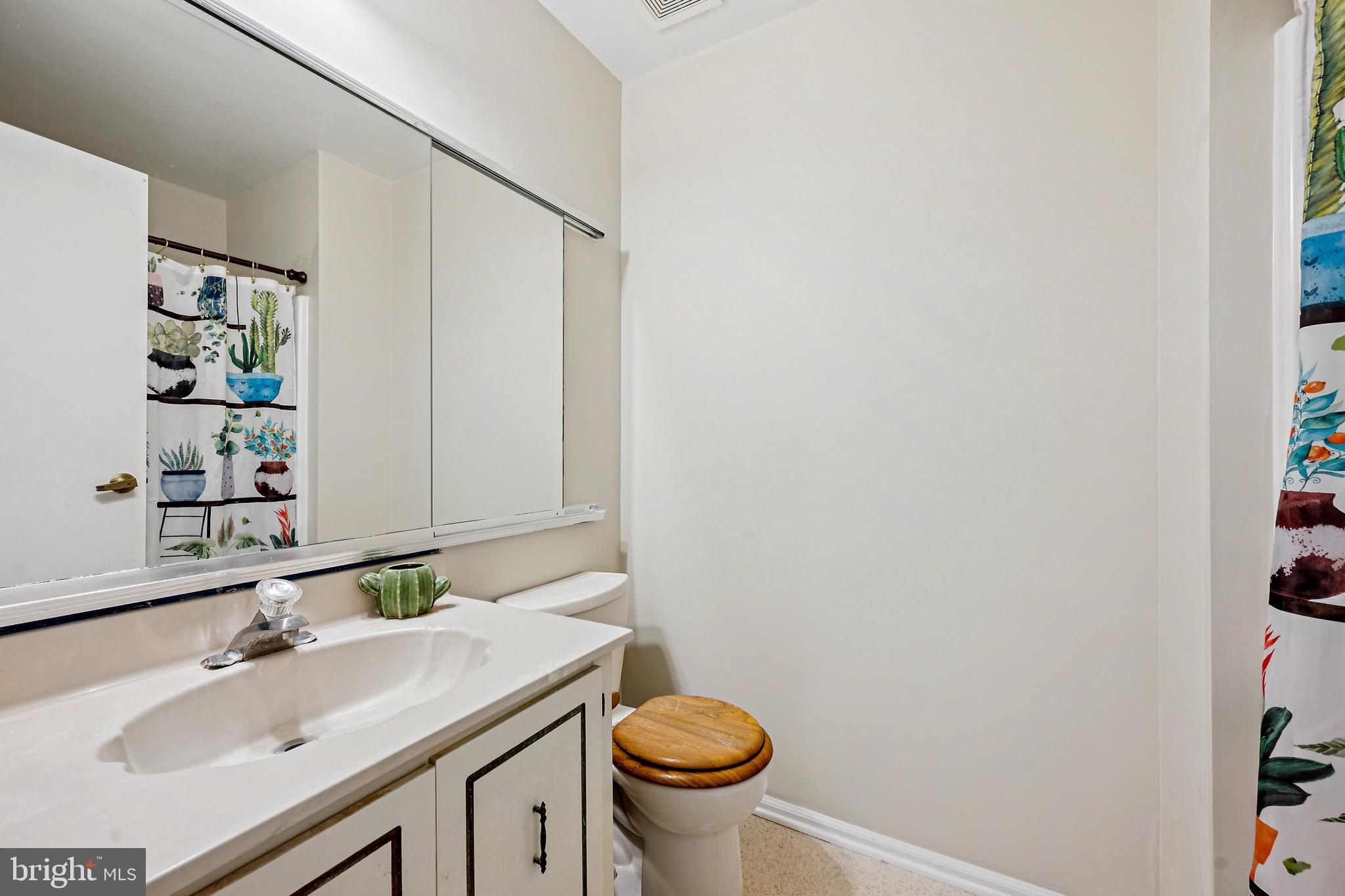 112 Village Lane Mount Laurel, NJ 08054 - Photo 13 of 17 a bathroom with a sink and a mirror
