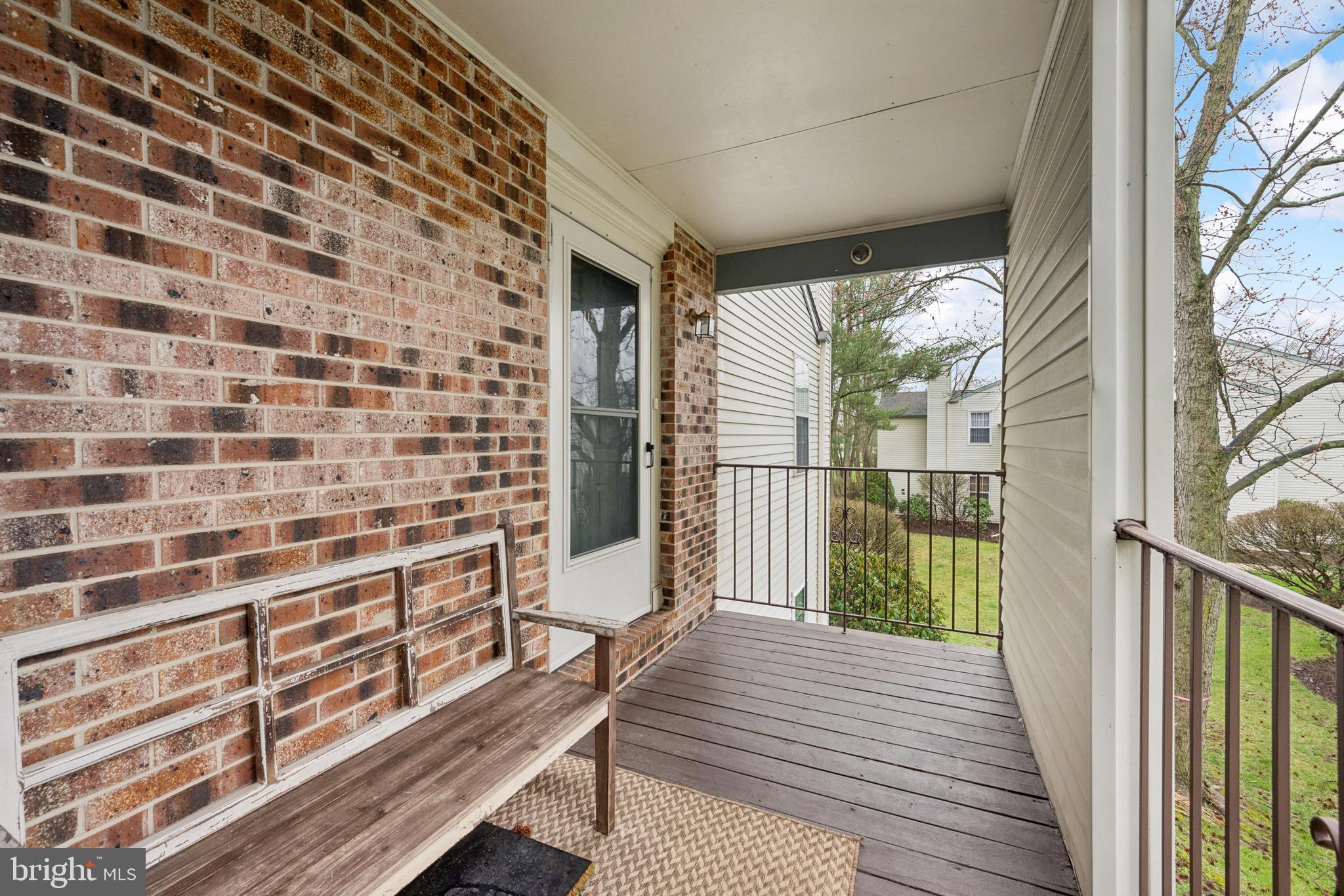 112 Village Lane Mount Laurel, NJ 08054 - Photo 16 of 17 a balcony with view of wooden floor
