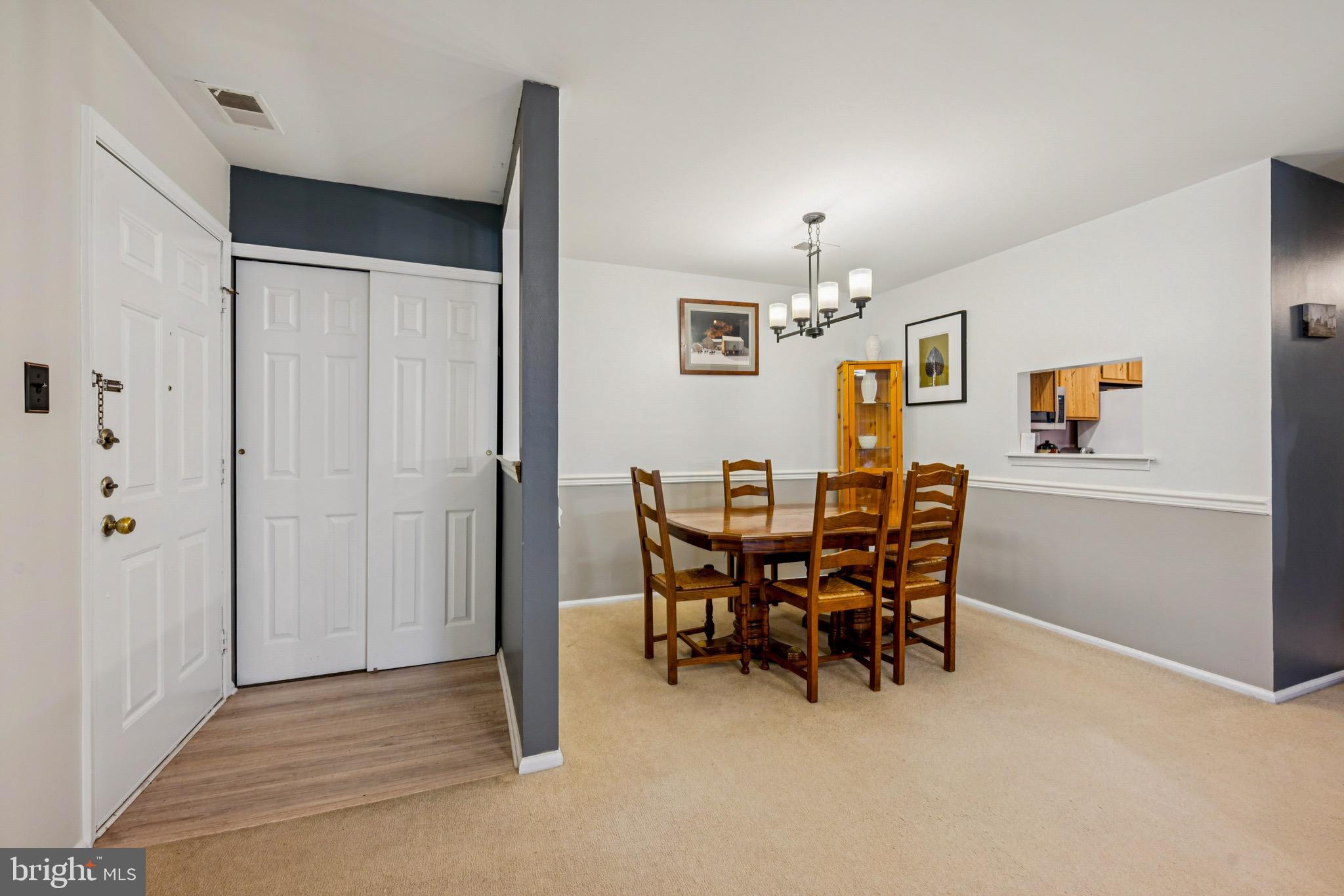 112 Village Lane Mount Laurel, NJ 08054 - Photo 5 of 17 a view of a dining room with furniture and chandelier