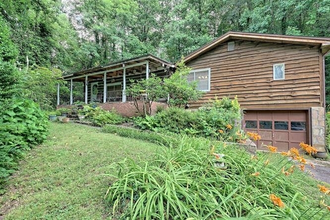 11 Ocmulgee Way Rabun Gap, GA 30568 - Photo 1 of 1 a view of a house with a yard and plants