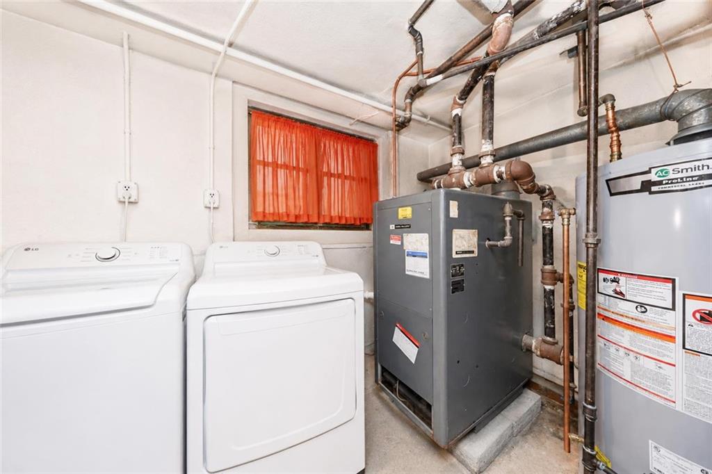 1 Bay Ridge Parkway Brooklyn, NY 11209 - Photo 32 of 38 a utility room with dryer and washer