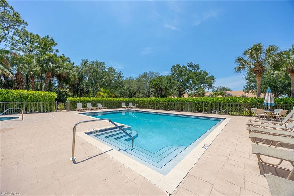 9030 Spring Run Boulevard, Unit 508 Estero, FL 34135 - Photo 28 of 41 a view of swimming pool with seating space