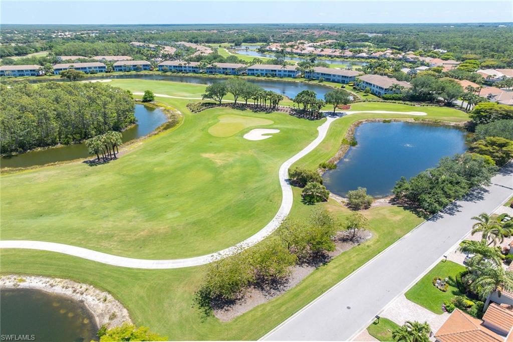 9030 Spring Run Boulevard, Unit 508 Estero, FL 34135 - Photo 30 of 41 an aerial view of a house with a swimming pool yard and outdoor seating