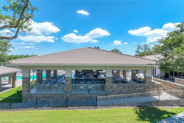 a view of a swimming pool with a lake view