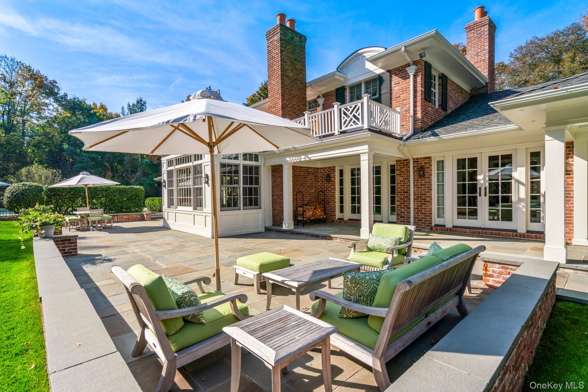 30 Underhill Road Locust Valley, NY 11560 - Photo 11 of 32 Patio off the family room.