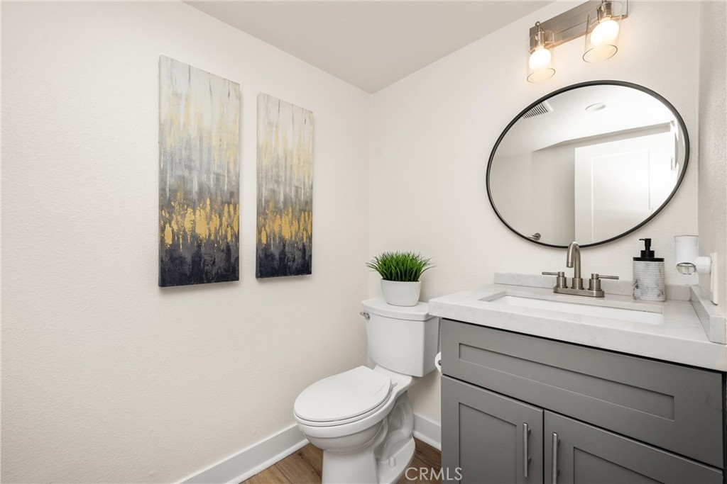 1538 Windsor Lane Fullerton, CA 92831 - Photo 20 of 40 a bathroom with a toilet sink and mirror