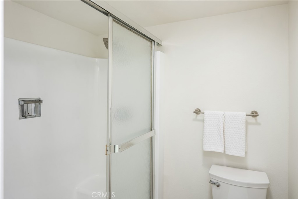 1538 Windsor Lane Fullerton, CA 92831 - Photo 27 of 40 a bathroom with a shower a toilet and a sink