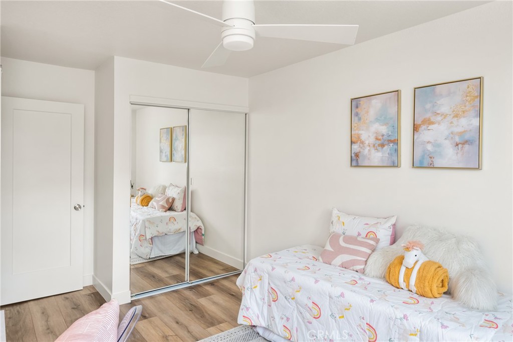 1538 Windsor Lane Fullerton, CA 92831 - Photo 30 of 40 a bedroom with a bed and a painting on the wall