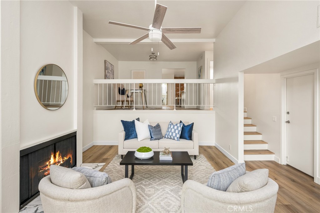 1538 Windsor Lane Fullerton, CA 92831 - Photo 7 of 40 a living room with furniture and a wooden floor