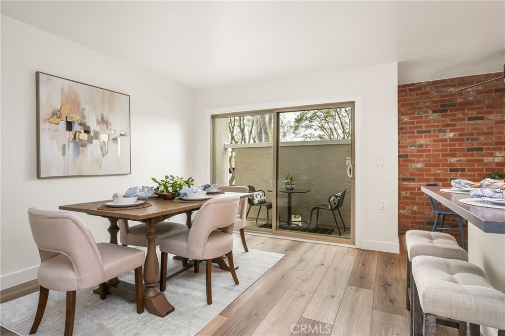 1538 Windsor Lane Fullerton, CA 92831 - Photo 10 of 40 a view of a dining room with furniture window and wooden floor